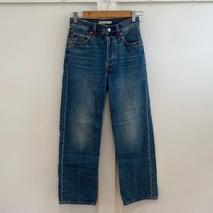 Size 26; Levi’s Ribcage straight in a medium blue wash. In perfect condition!